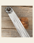 Leather Silver Carnation with White Fringe on a warm cream background