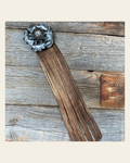 Leather Silver Gardenia with Copper Fringe on a warm cream background