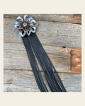 Leather Silver Lotus with Black Fringe on a warm cream background
