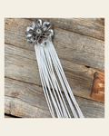 Leather Silver Lotus with White Fringe on a warm cream background