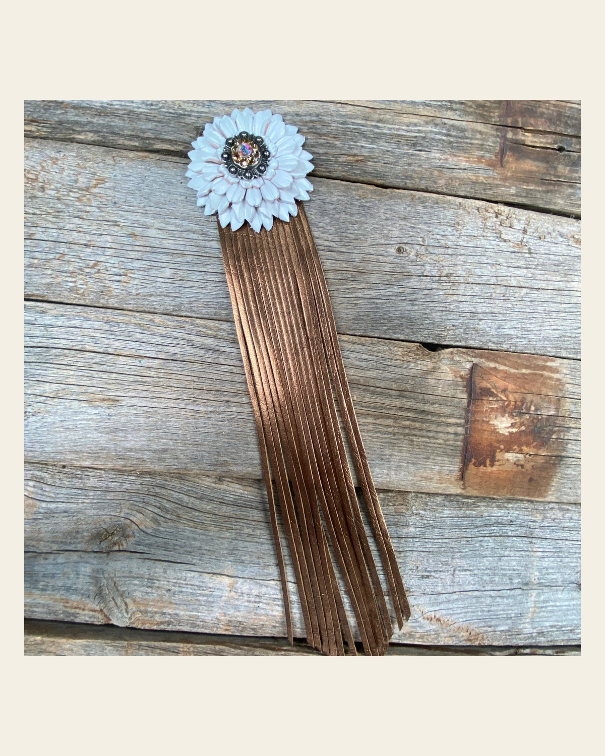 Leather White Daisy with Copper Fringe on a warm cream background