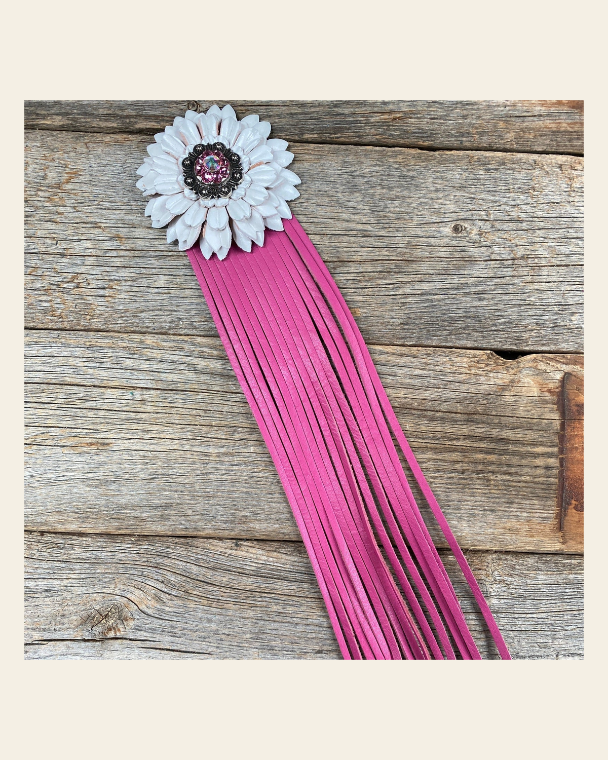 Leather White Daisy with Pink Fringe on a warm cream background