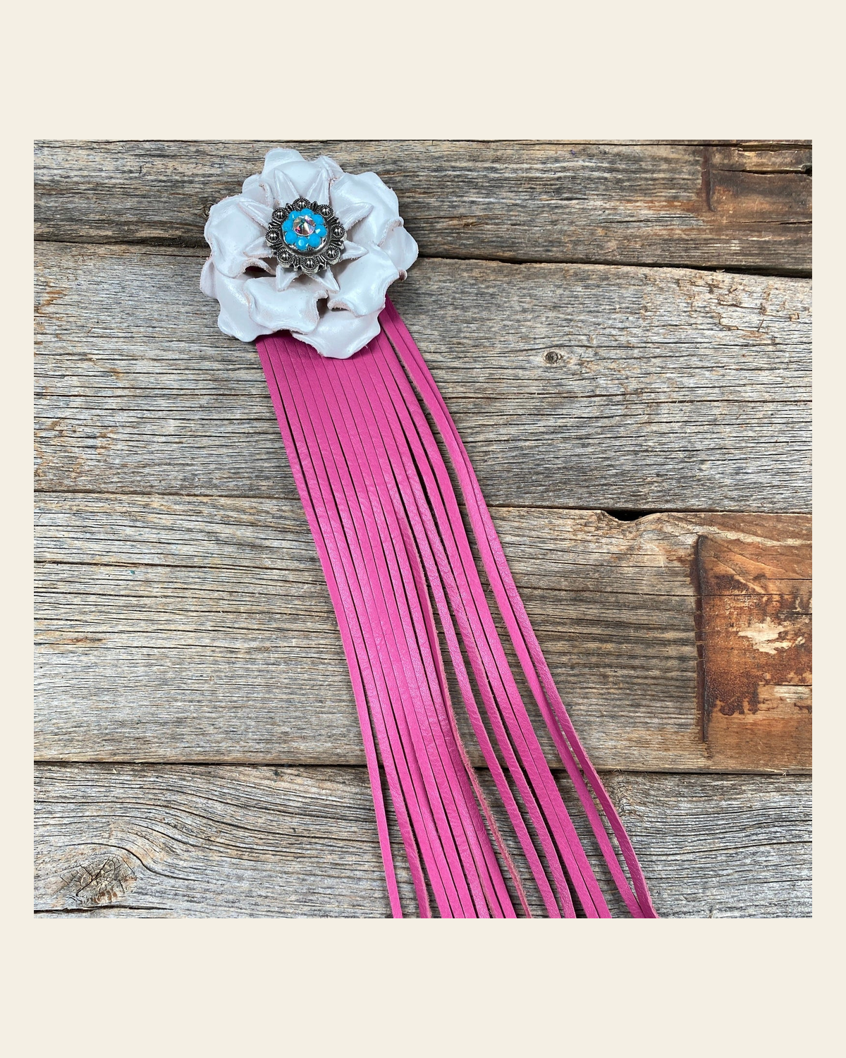 Leather White Gardenia with Pink Fringe on a warm cream background