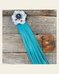Leather White Gardenia with Turquoise Fringe on a warm cream background