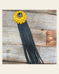 Leather Yellow Daisy with Black Fringe on a warm cream background