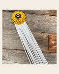 Leather Yellow Daisy with White Fringe on a warm cream background