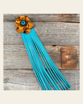 Leather Yellow Rose with Turquoise Fringe on a warm cream background