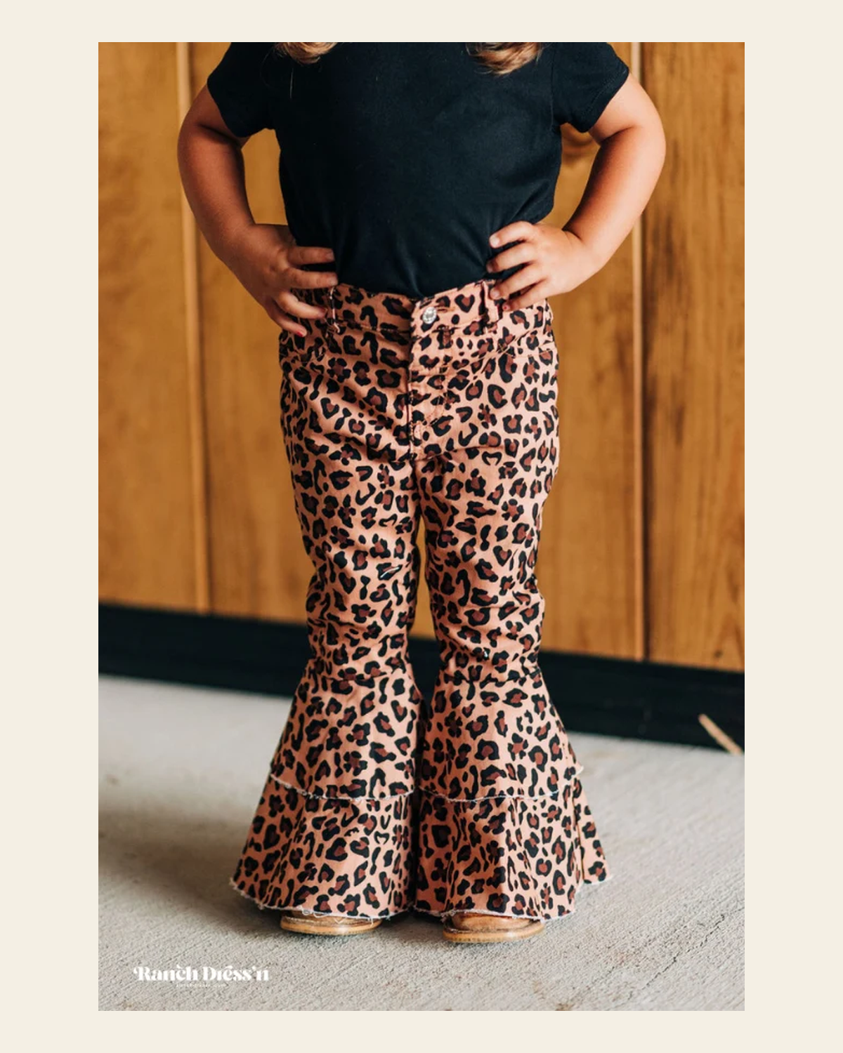 Leopard Ruffle Bells on a warm cream background