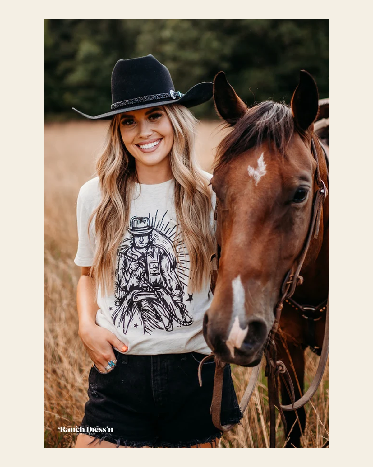 Let's Go Cowboy- Heather Natural Tee on a warm cream background