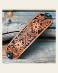 Light Oil Floral Bronc Noseband With Antique Silver Flower Conchos on a warm cream background