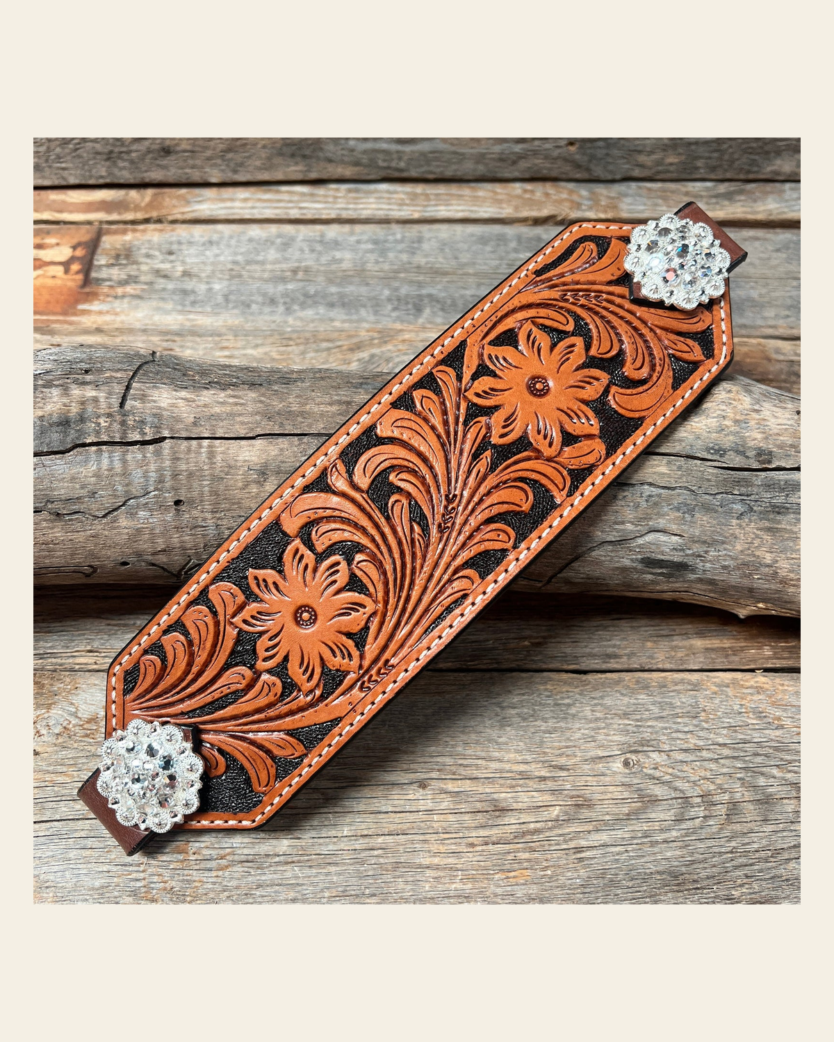 Light Oil Floral Bronc Noseband With Bright Silver Conchos on a warm cream background