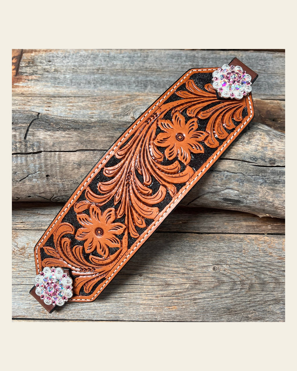 Light Oil Floral Bronc Noseband With Bright Silver Conchos on a warm cream background