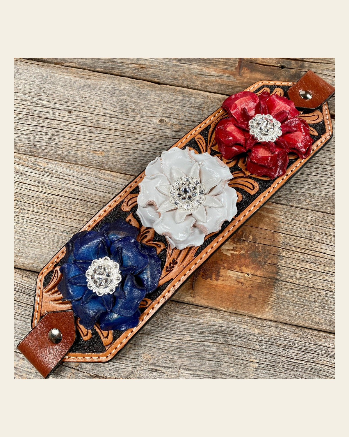Light Oil Floral Bronc Noseband With Patriotic Flowers on a warm cream background