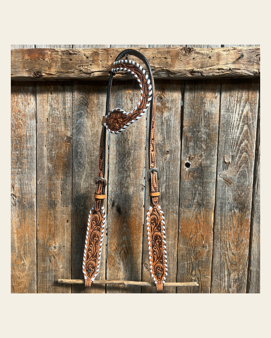 Light Oil Floral Tooled with White Whipstitch One Ear Headstall / Bridle on a warm cream background
