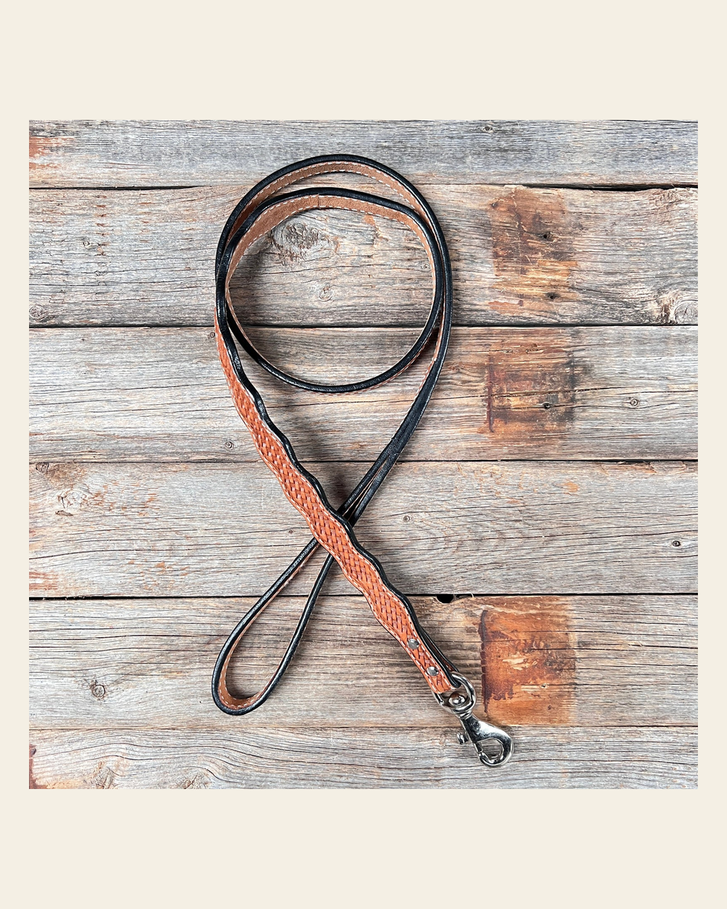 Light Oil Genuine Leather leash 4' x 1" wide on a warm cream background