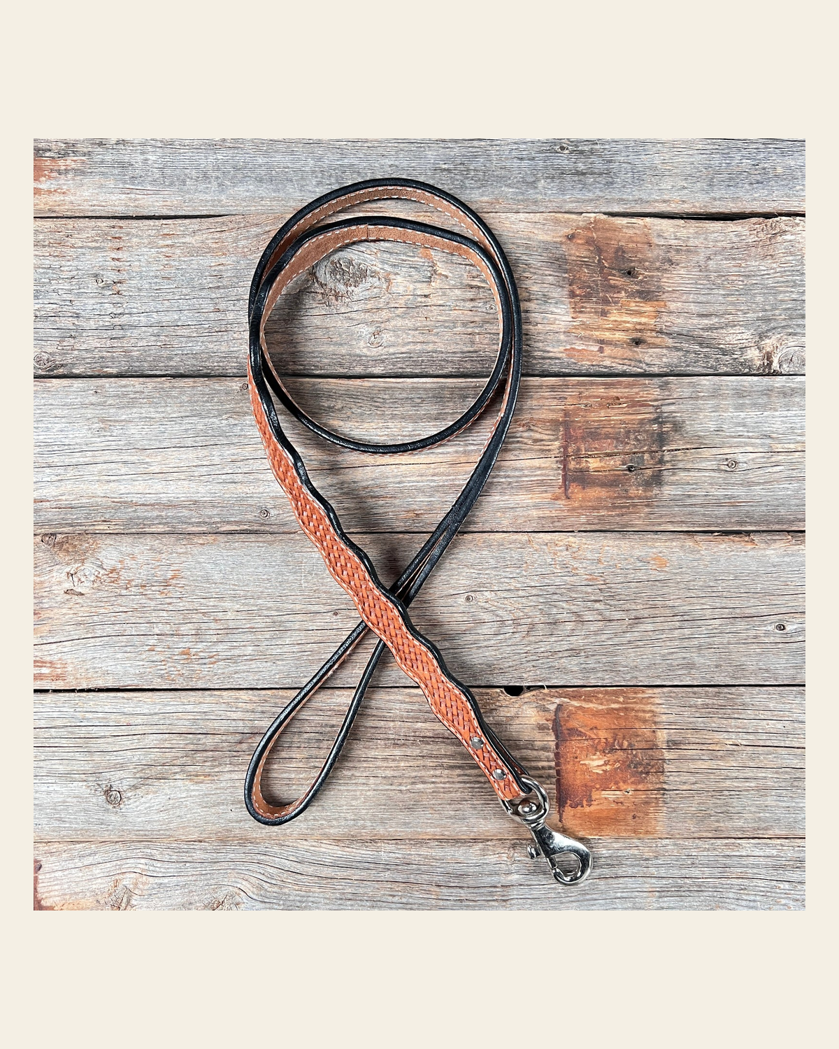 Light Oil Genuine Leather leash 4' x 1" wide on a warm cream background