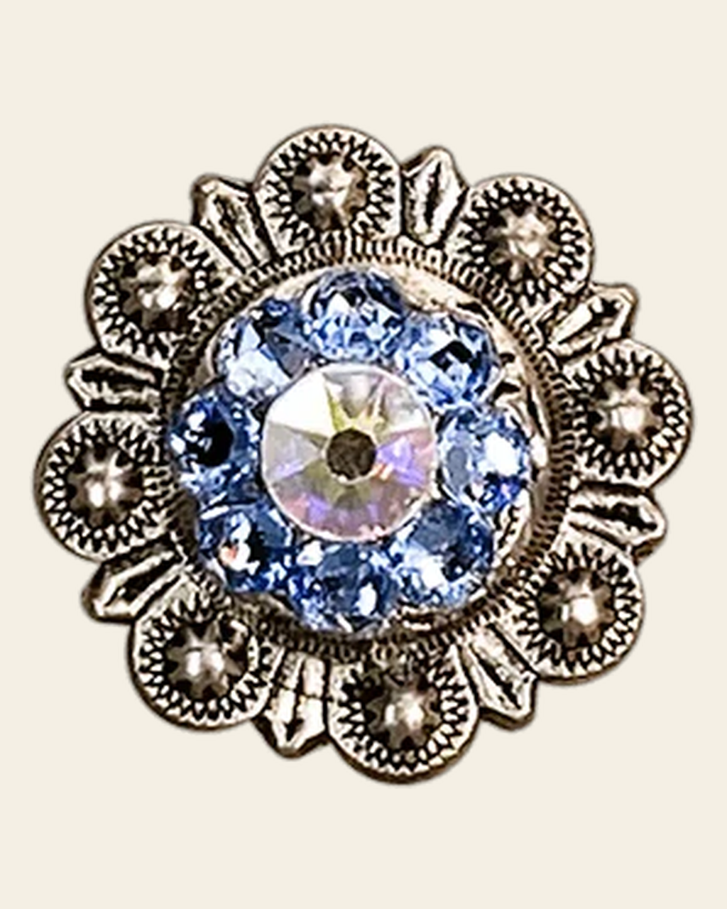 Light Sapphire & AB Antique Silver 1" European Crystal Concho on a warm cream background