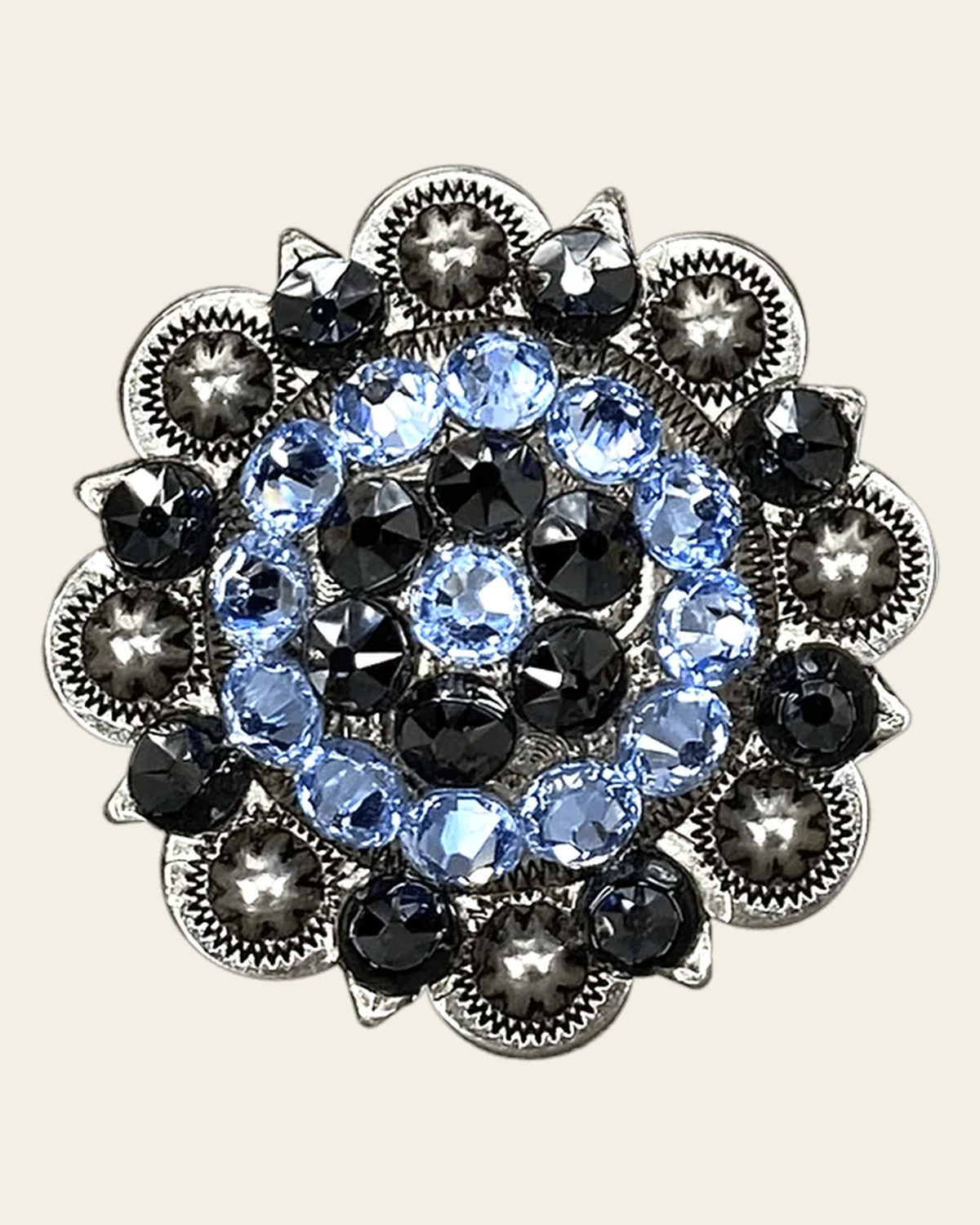 Light Sapphire & Jet Antique Silver 2" European Crystal Concho on a warm cream background