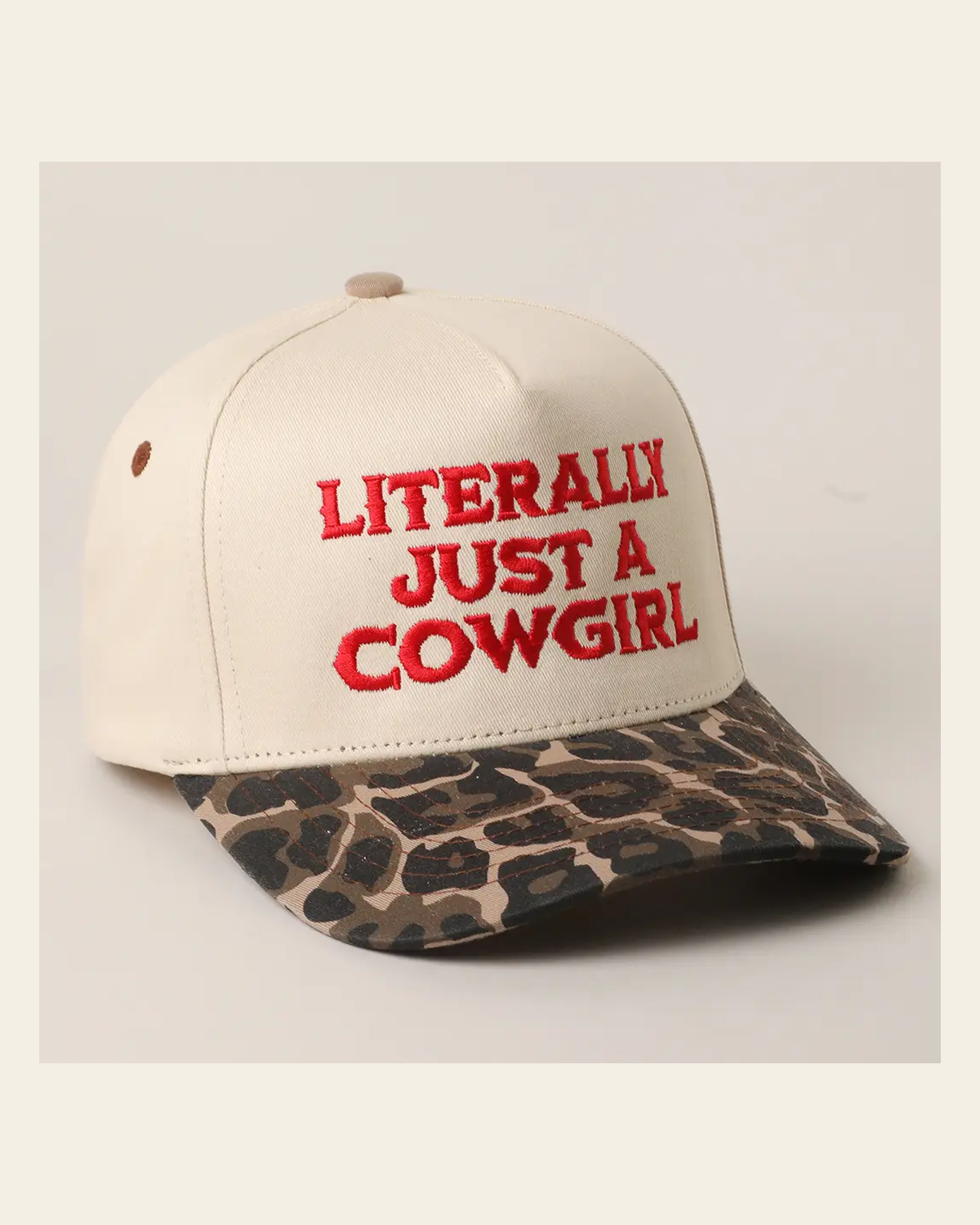 Literally Just A Cowgirl Trucker | Cap on a warm cream background