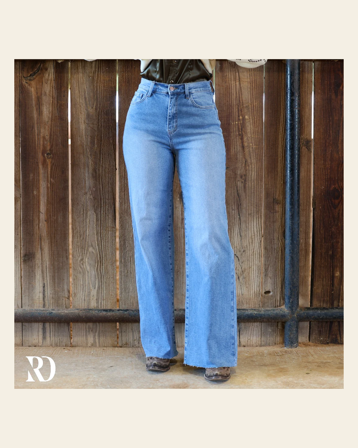 Logan Wide Leg Denim | Jeans on a warm cream background