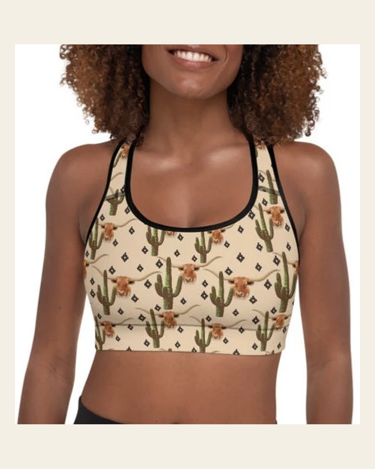 Longhorn Ranch Cactus Padded Sports Bra on a warm cream background