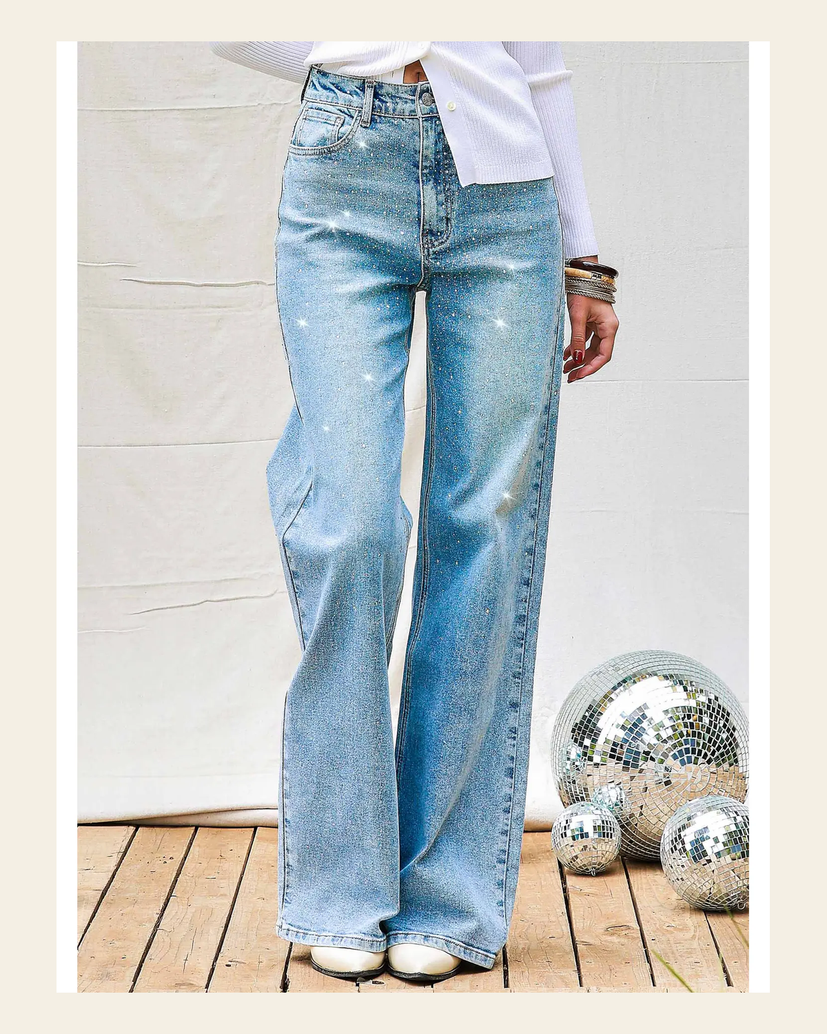 Luxa Iridescent Rhinestone Denim | Jeans on a warm cream background