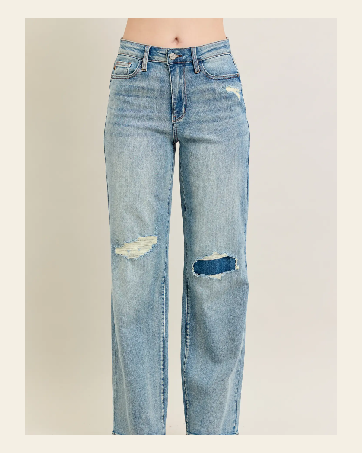 Mae Distressed Straight Denim | Jeans on a warm cream background
