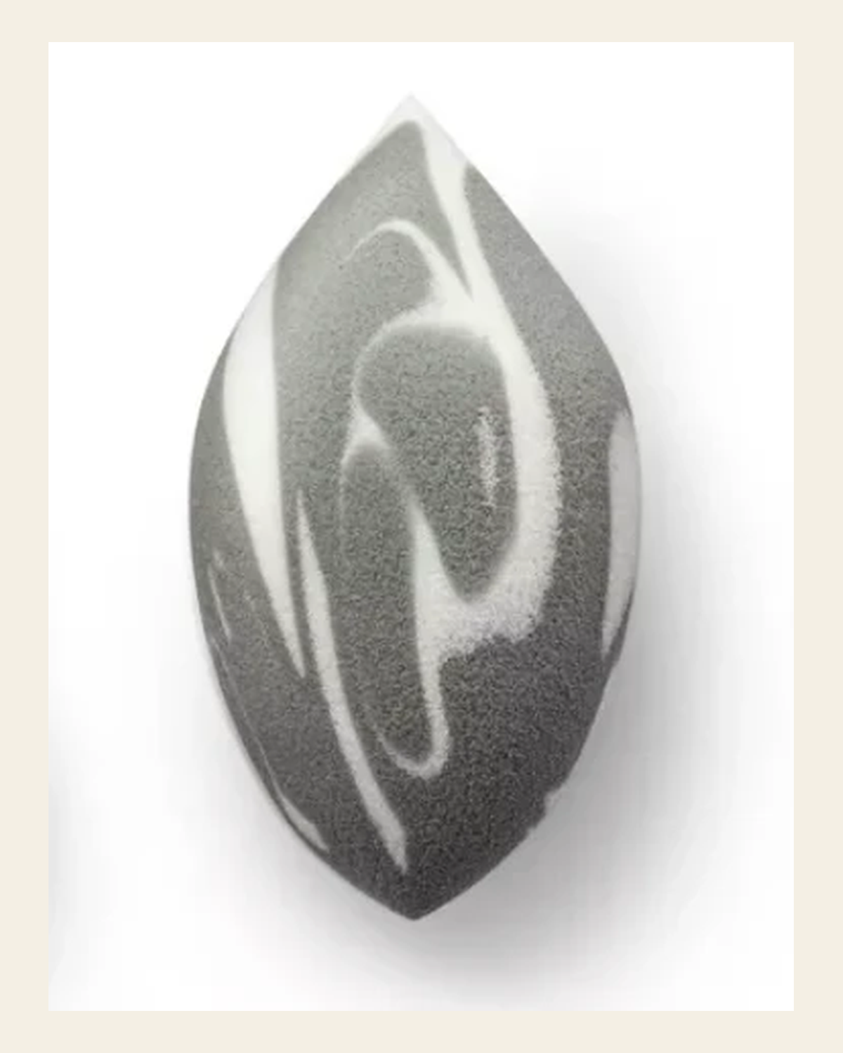 MARBLE MAKEUP SPONGE x GlowJunkie on a warm cream background