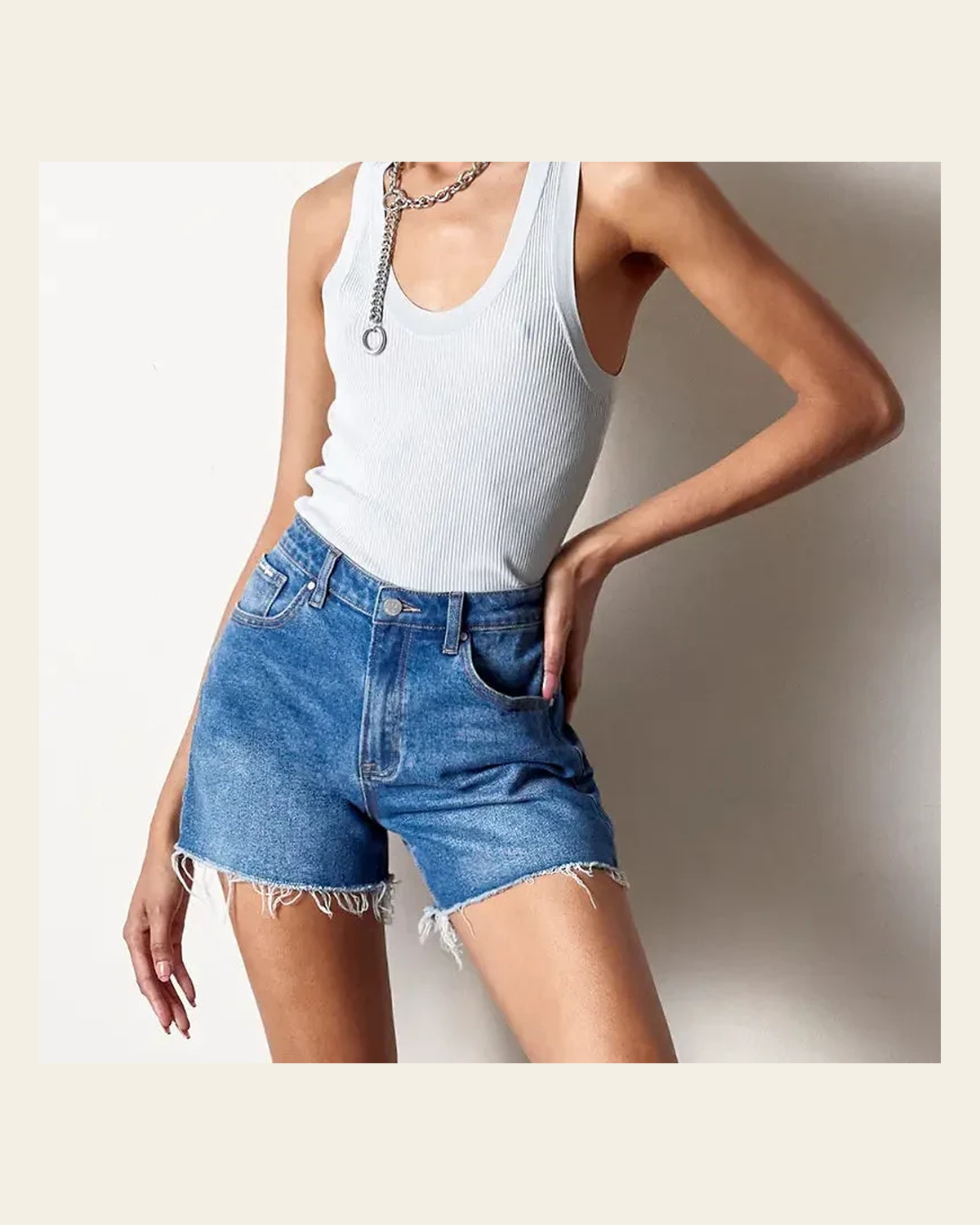 Maxlyn Midi Stretch Denim | Shorts on a warm cream background