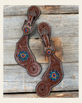Medium Floral Spur Straps - Copper Crystal Conchos #SS110 on a warm cream background