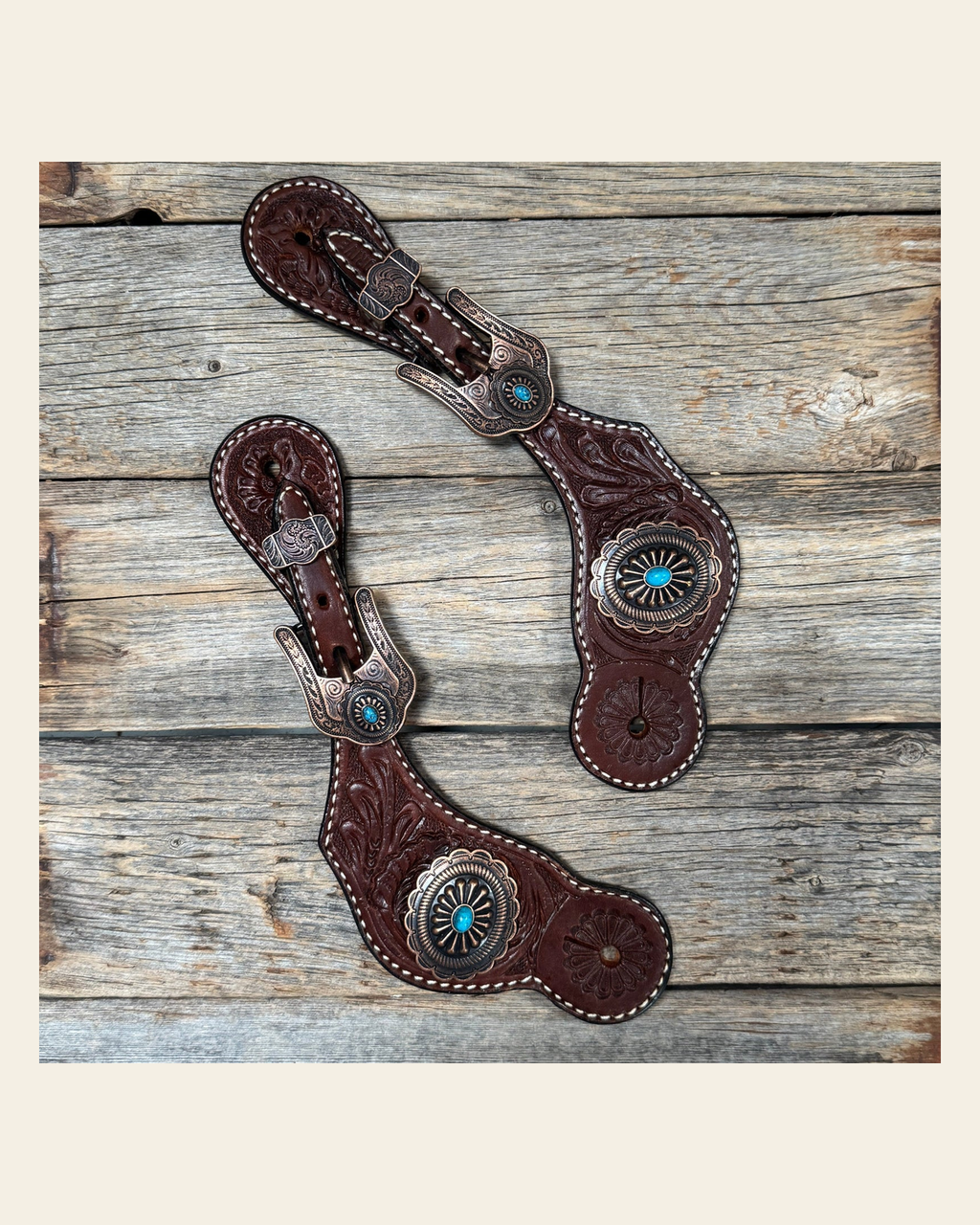 Medium Floral Spur Straps - Copper Western Conchos #SS117 on a warm cream background