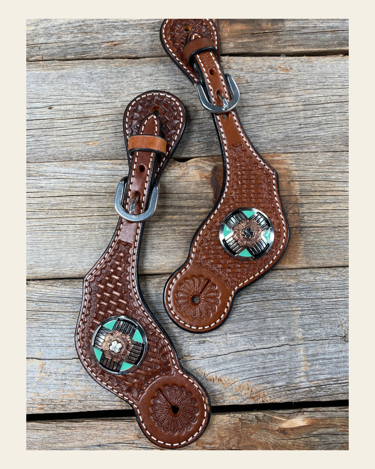 Medium Oil Basketweave Spur Straps - Antique Silver Western Conchos #SS102 on a warm cream background