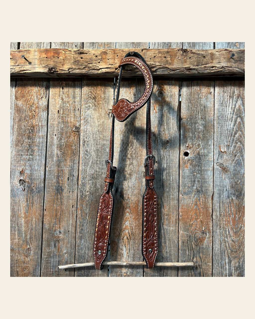 Medium Oil Floral Tooled Copper Buckstitching & Dots One Ear Headstall / Bridle on a warm cream background