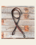 Medium Oil Genuine Leather leash 4' x 1" wide on a warm cream background