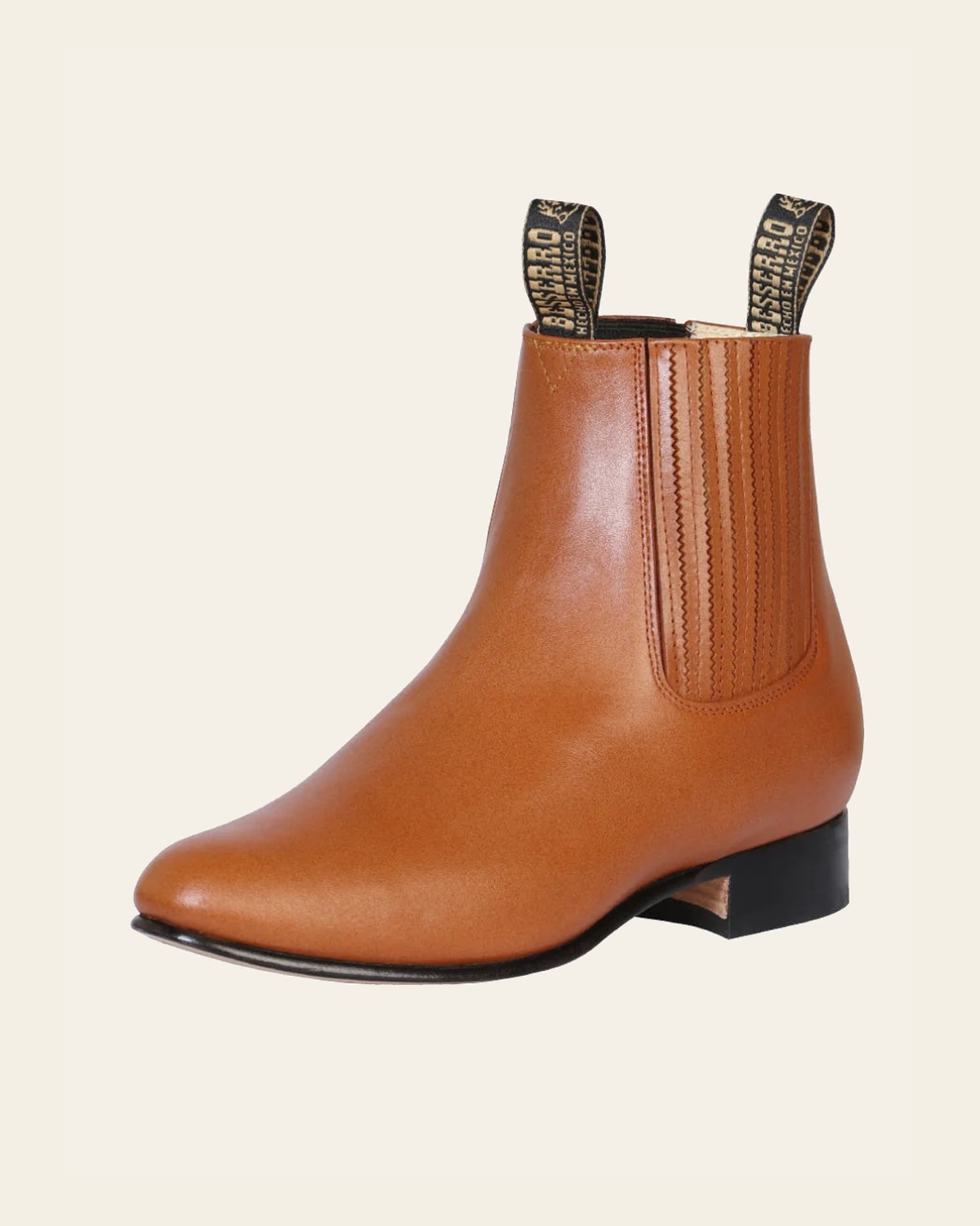 El Besserro Men's Leather Charro Ankle Boots - Made in Mexico - Brandy 1910 on a warm cream background