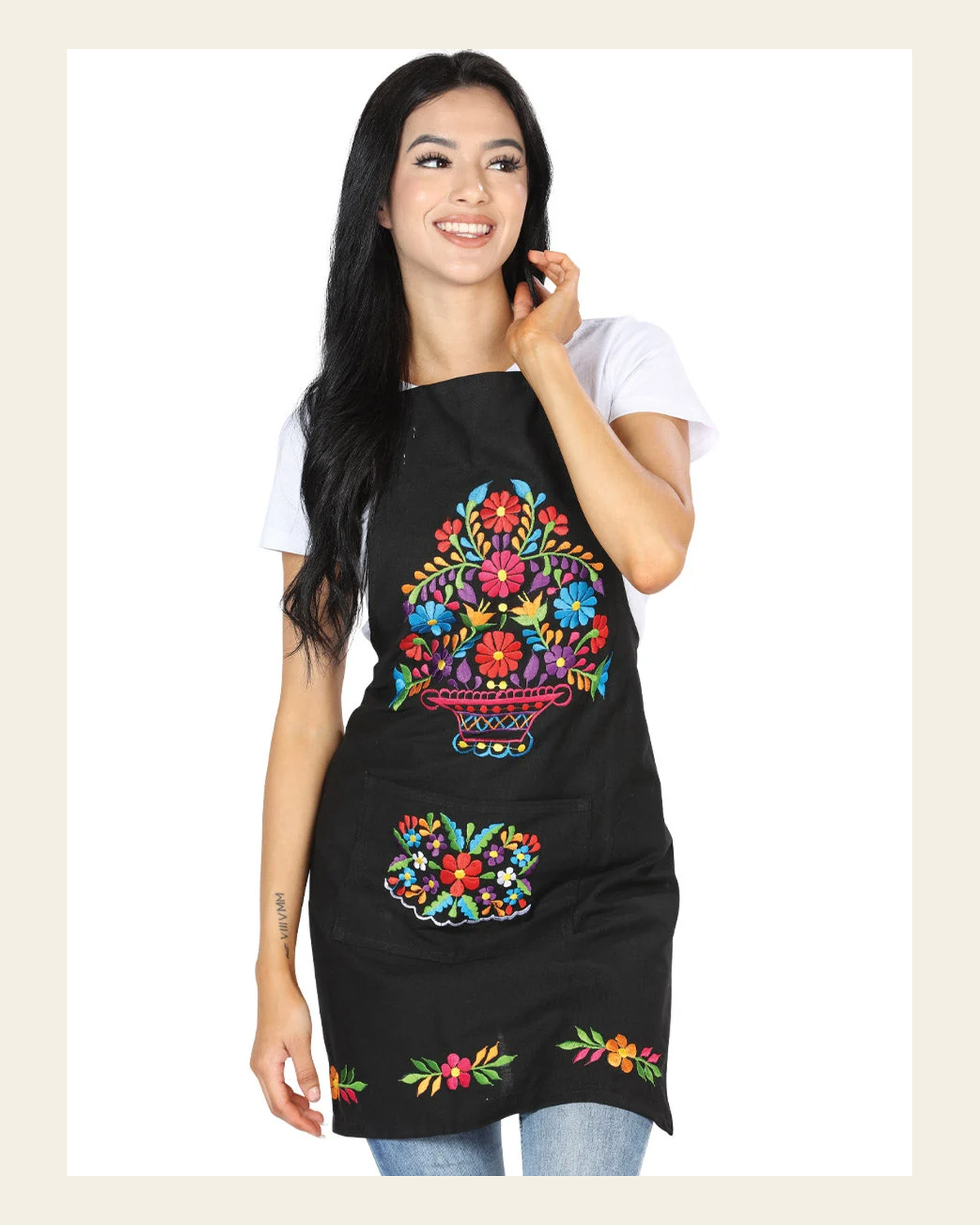 Mexican Artisanal Embroidered Apron 100% Cotton Black 603156 on a warm cream background