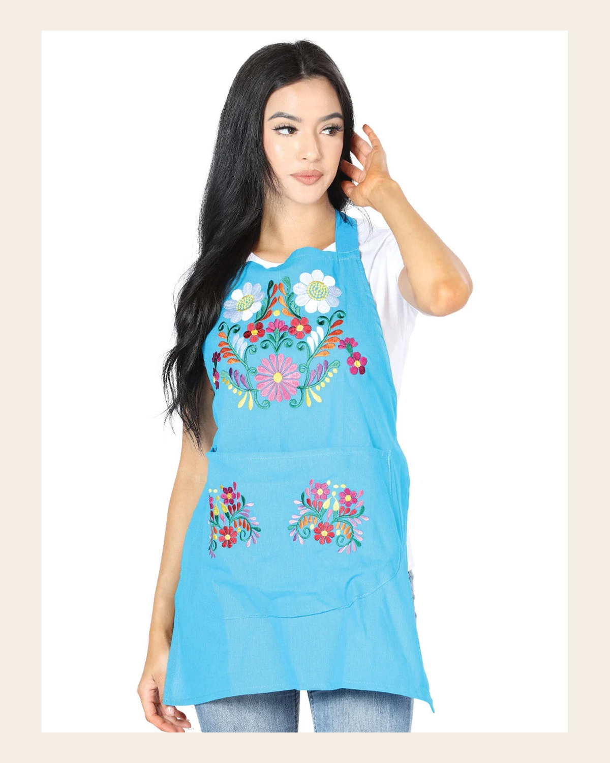 Mexican Artisanal Embroidered Apron 50% Cotton, %50 Polyester Blue 603199 on a warm cream background