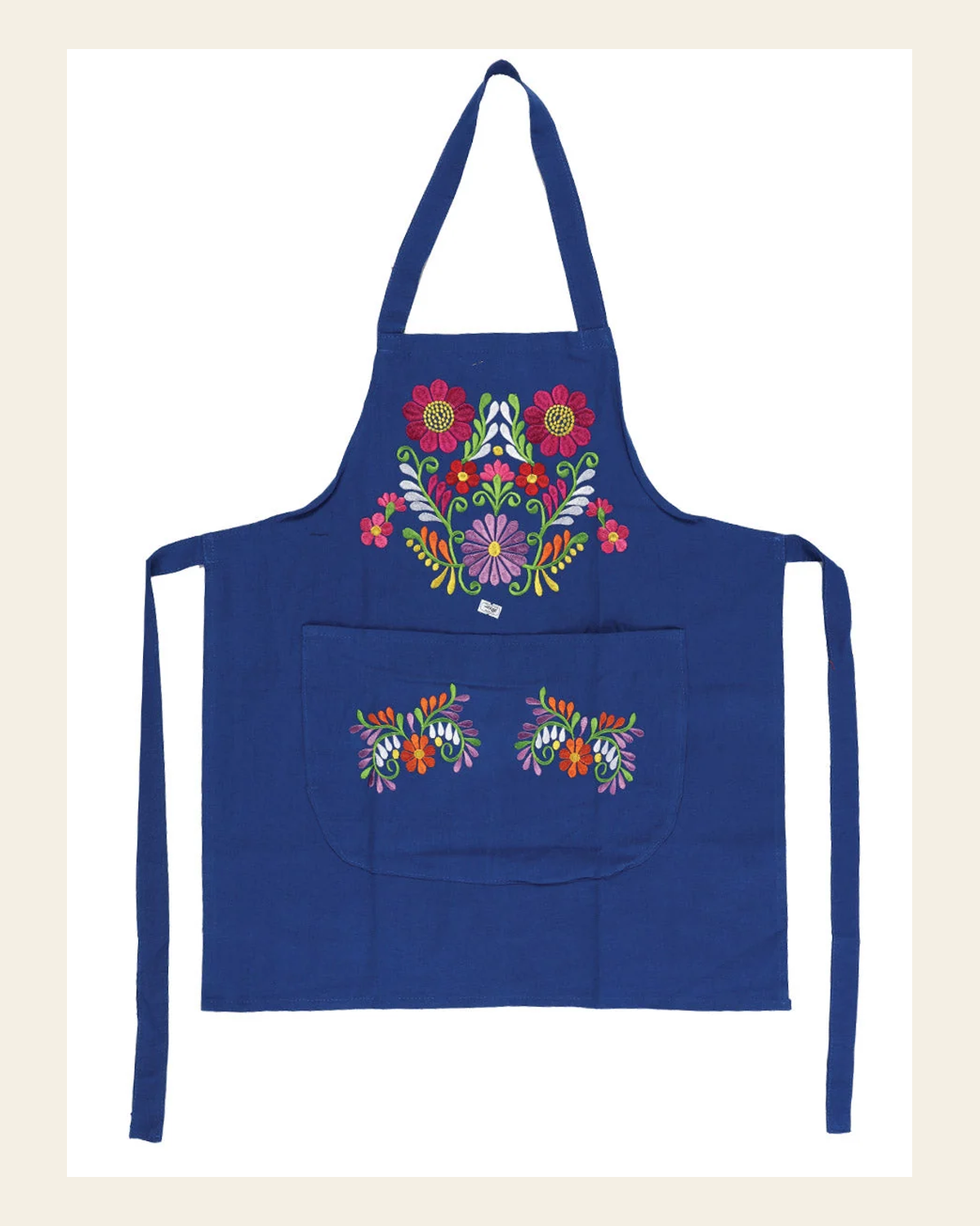 Mexican Artisanal Embroidered Apron 50% Cotton, %50 Polyester Royal Blue 603196 on a warm cream background