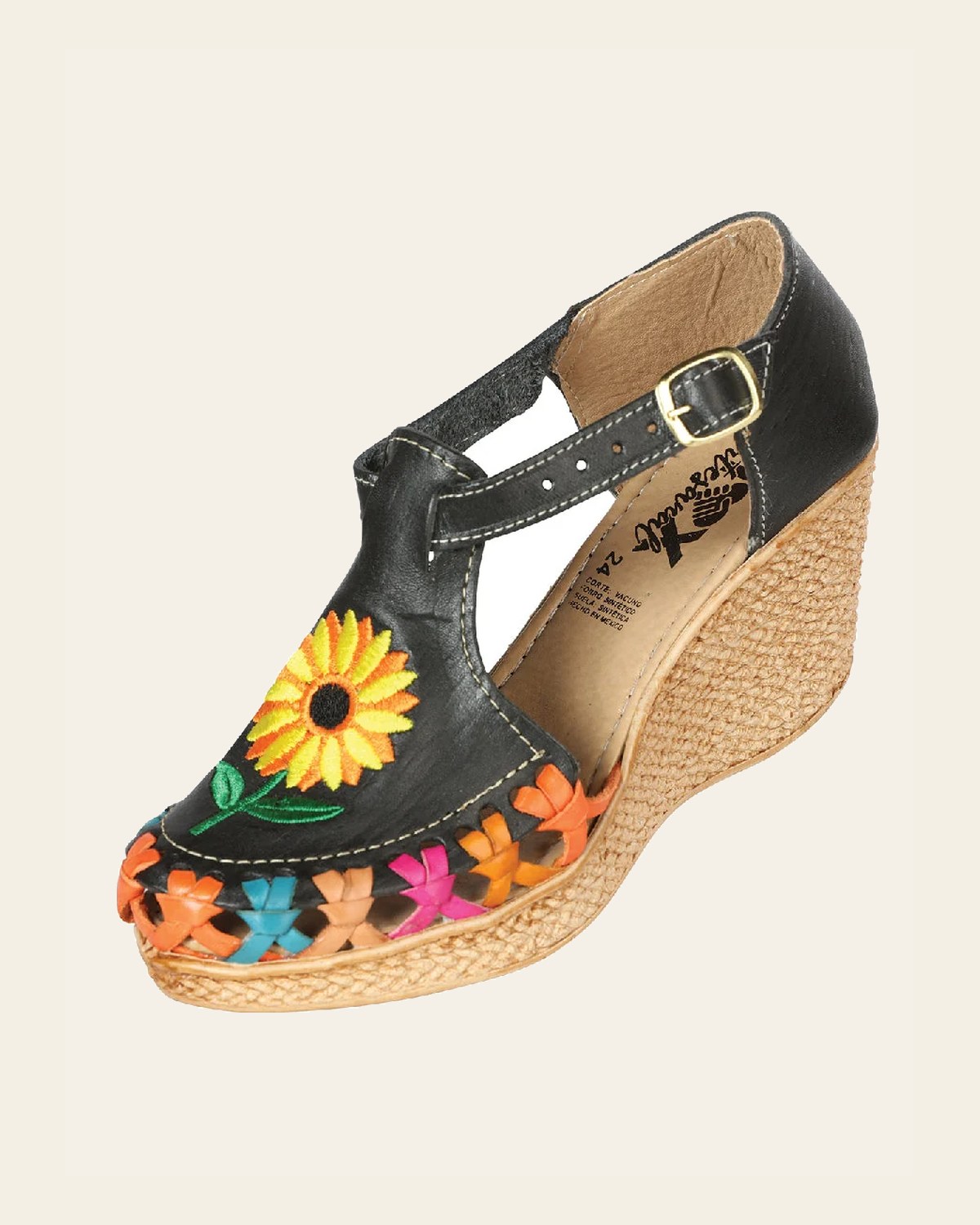 Mexican Artisanal Sandals Leather Black 603313 on a warm cream background