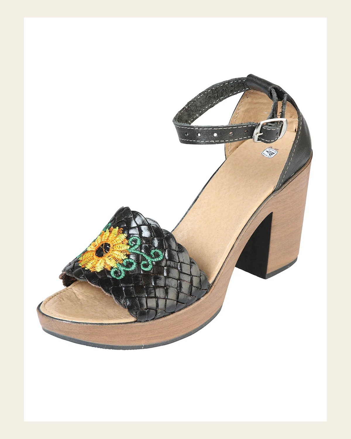Mexican Artisanal Sandals Leather Black 603921 on a warm cream background