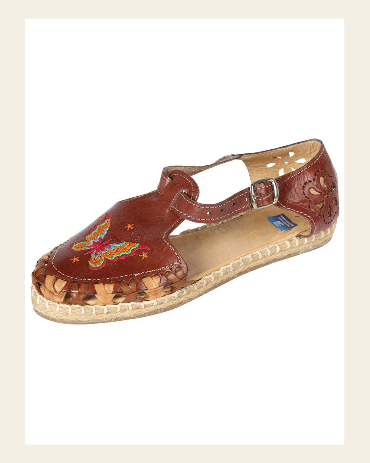 Mexican Artisanal Sandals Leather Brown 603317 on a warm cream background