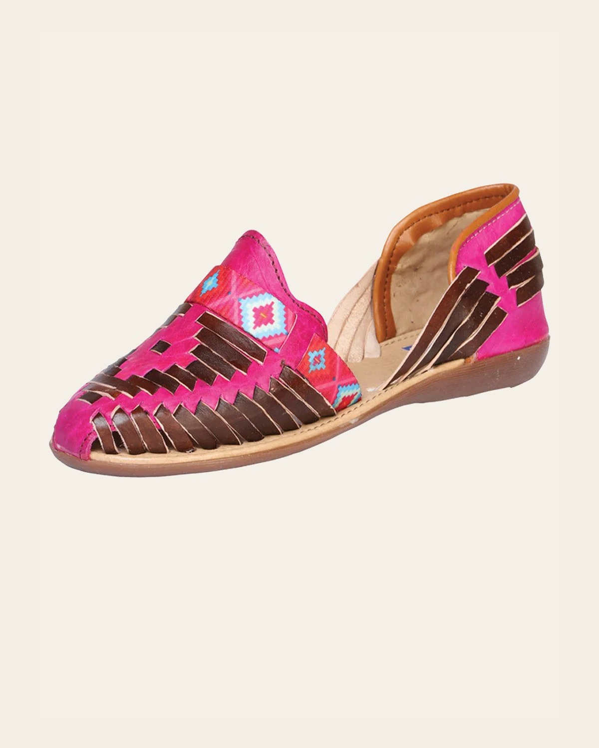 Mexican Artisanal Sandals Leather Fuchsia/Brown 601943 on a warm cream background