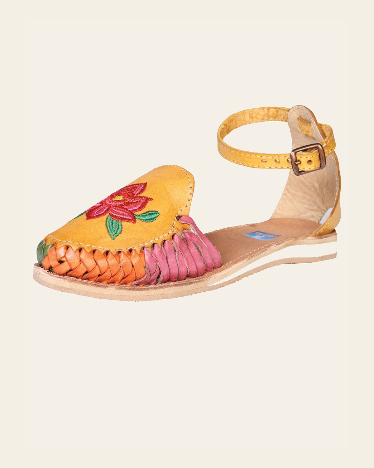 Mexican Artisanal Sandals Leather Mustard 602363 on a warm cream background