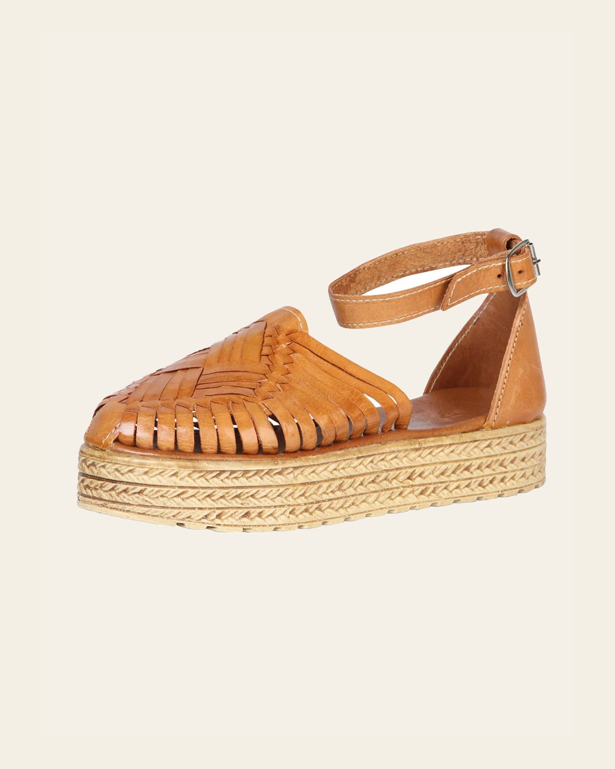 Mexican Artisanal Sandals Leather Tang 603923 on a warm cream background