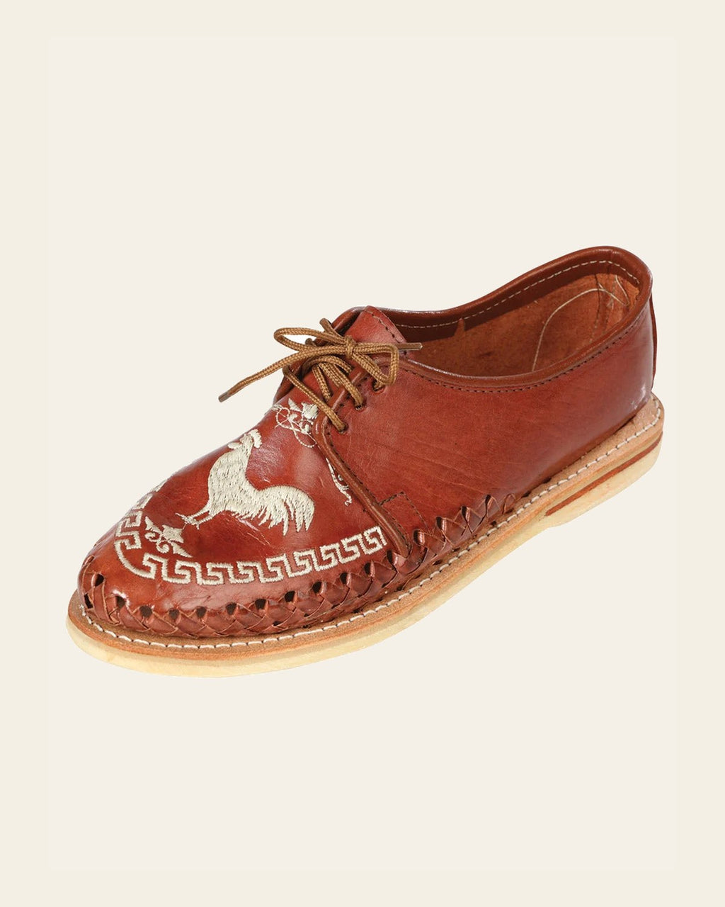 Mexican Artisanal Shoes Leather Honey/Brown 603357 on a warm cream background