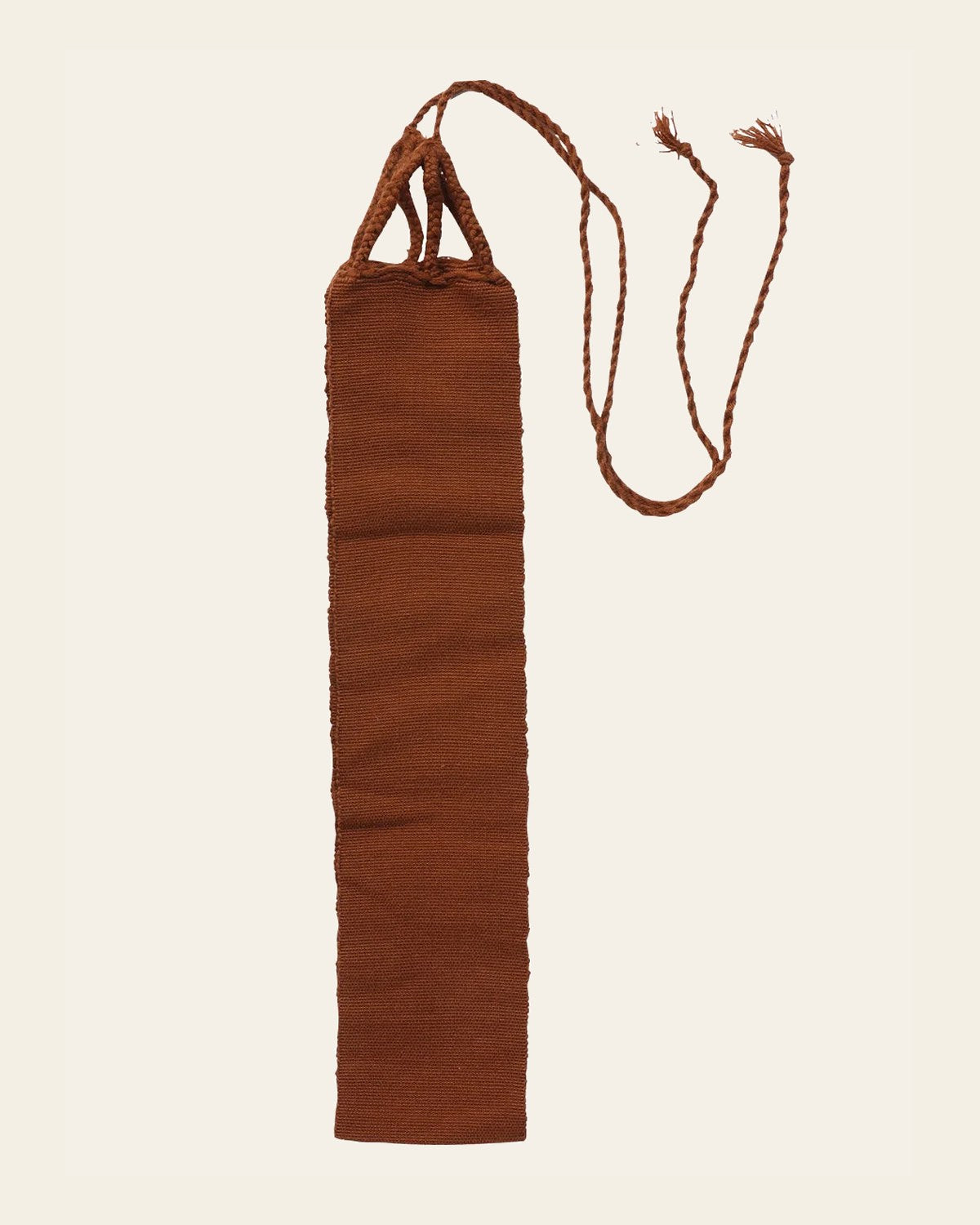 Mexican Artisanal Traditional Belt Brown 601458 on a warm cream background
