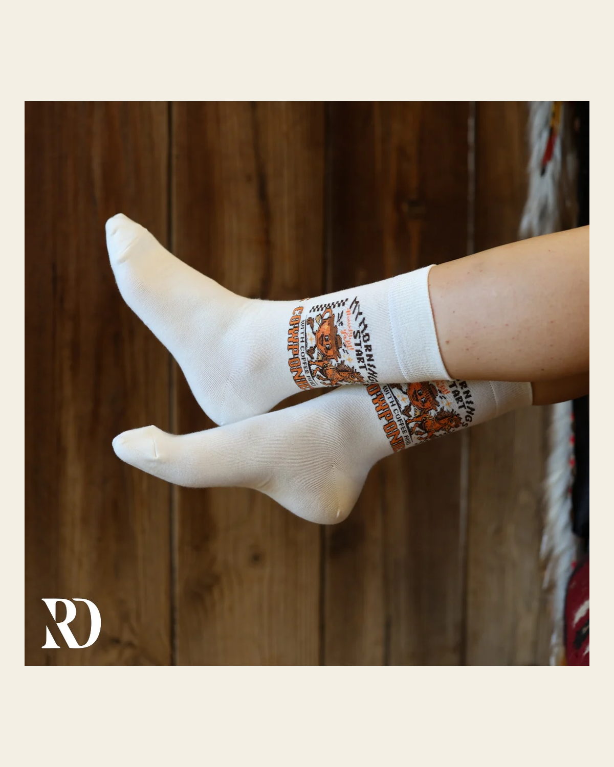 My Mornings Start With Coffee & Cowponies Socks on a warm cream background