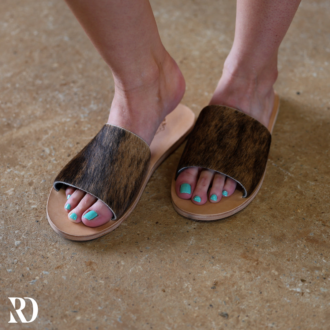 Nadia Cowhide | Slides