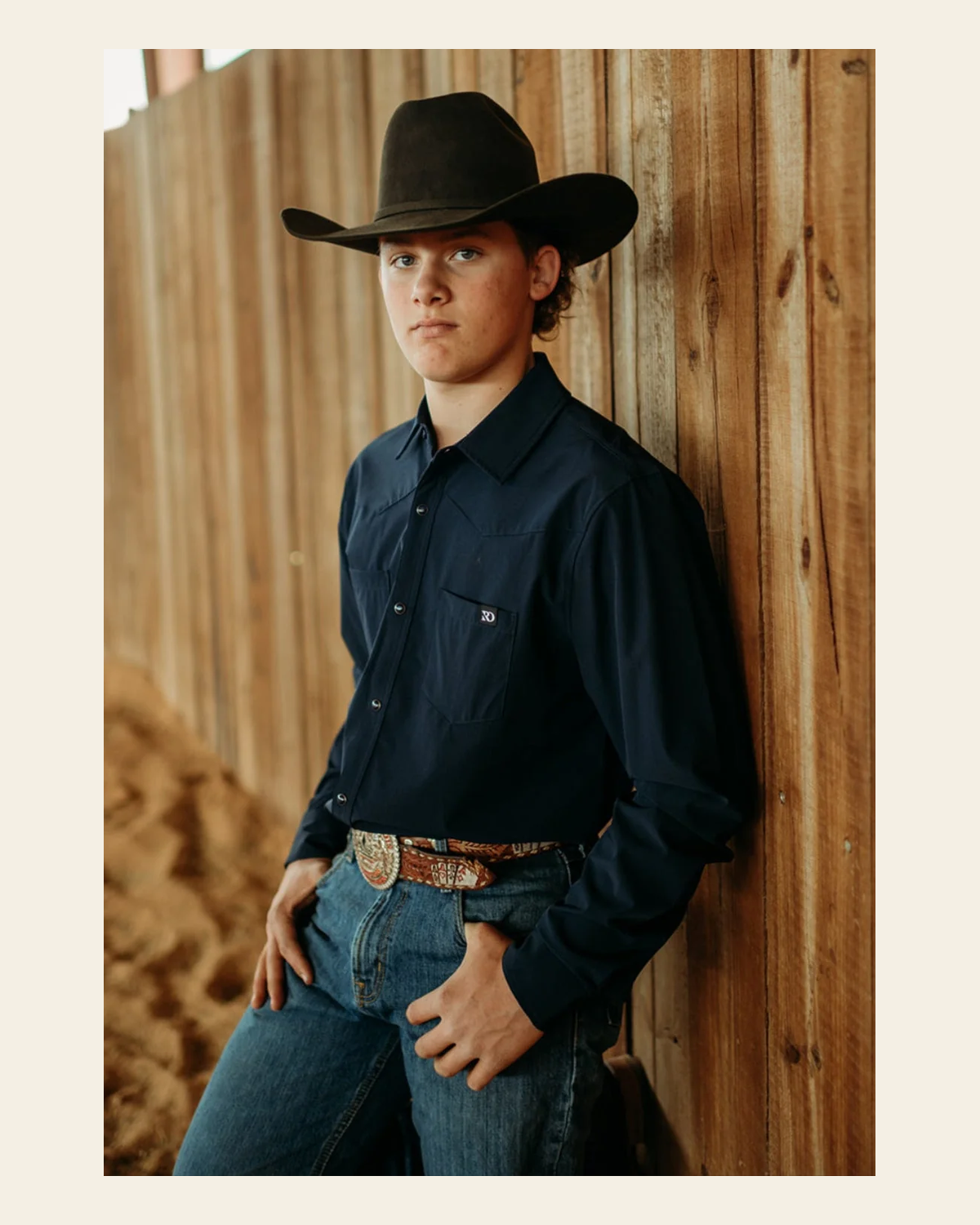 Navy Men's Breeze Performance Shirt on a warm cream background