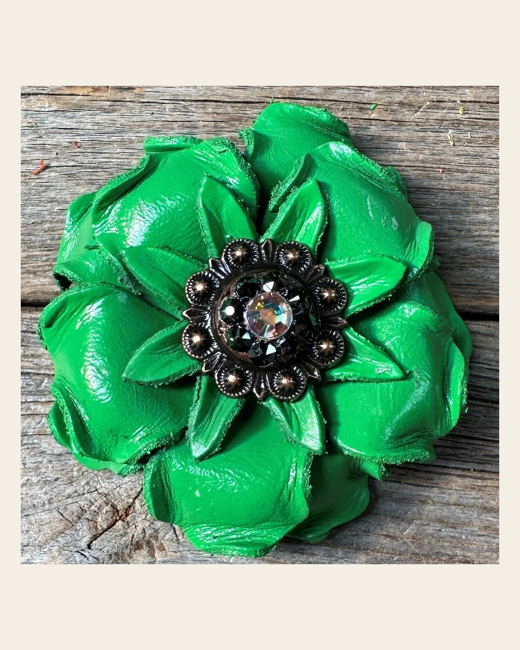 Neon Green Gardenia Flower With Copper AB & Jet 1" Concho on a warm cream background